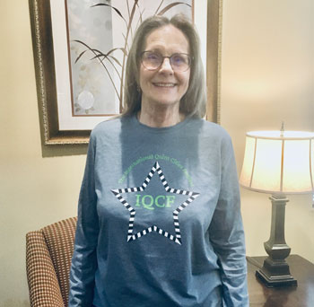 Photo of woman wearing a festival shirt